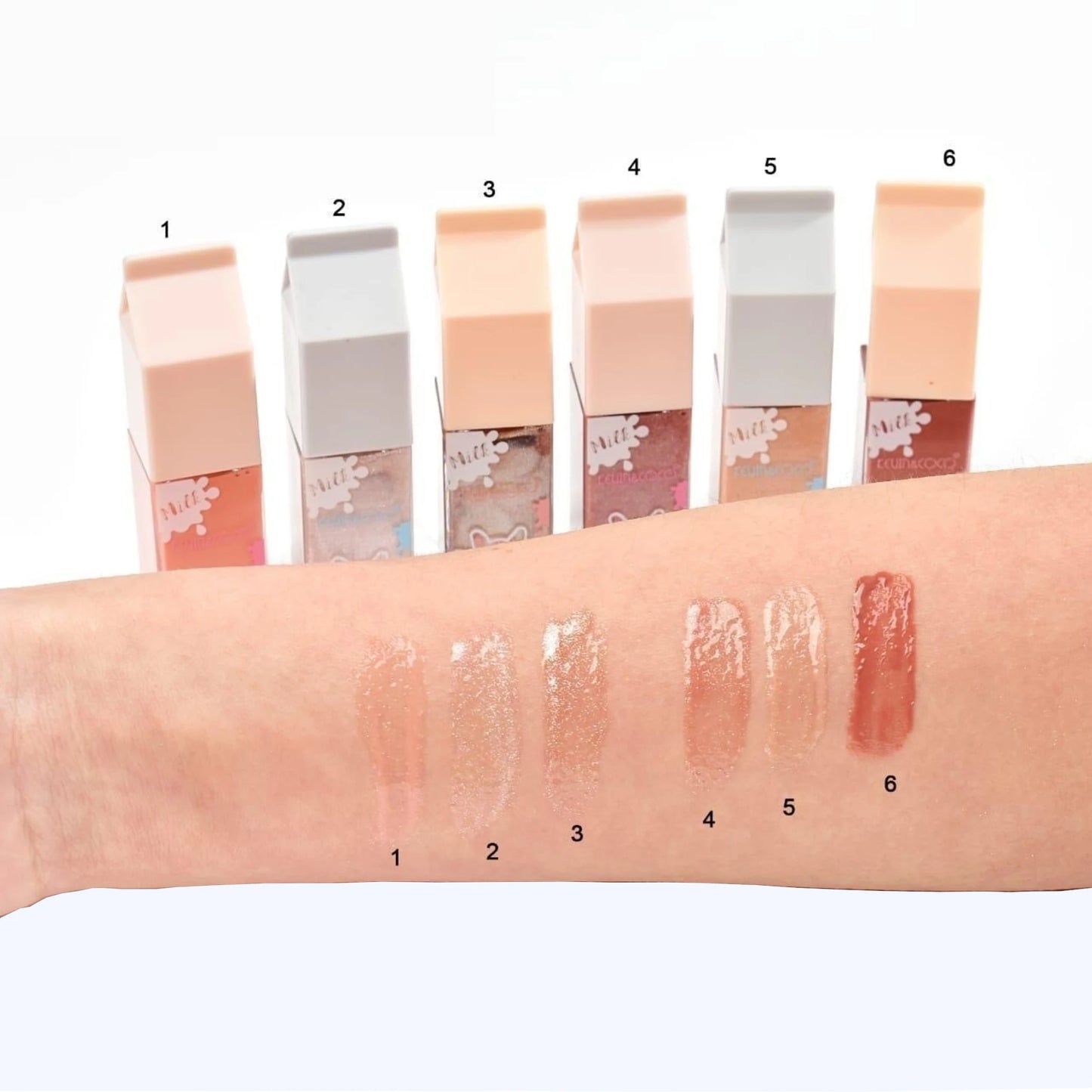 Pearly-Lustre Lip Gloss 1-3 - Kevin & Coco | Wholesale Makeup